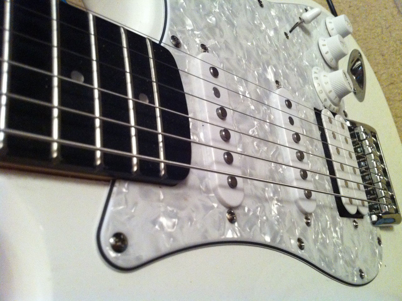 Illustration for article titled The Fretlight Guitar Sets a Shining Example for Hopeful Guitar Heroes
